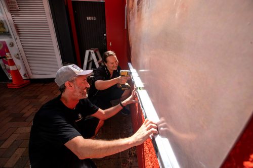 Picture by Tim Cuff 13 April 2021 - MakeShift Spaces Artwalk installations by Paul and Marika from Speedy Signs, Nelson, New Zealand: 'Rocks Road in the Making' by Charlotte Sadd